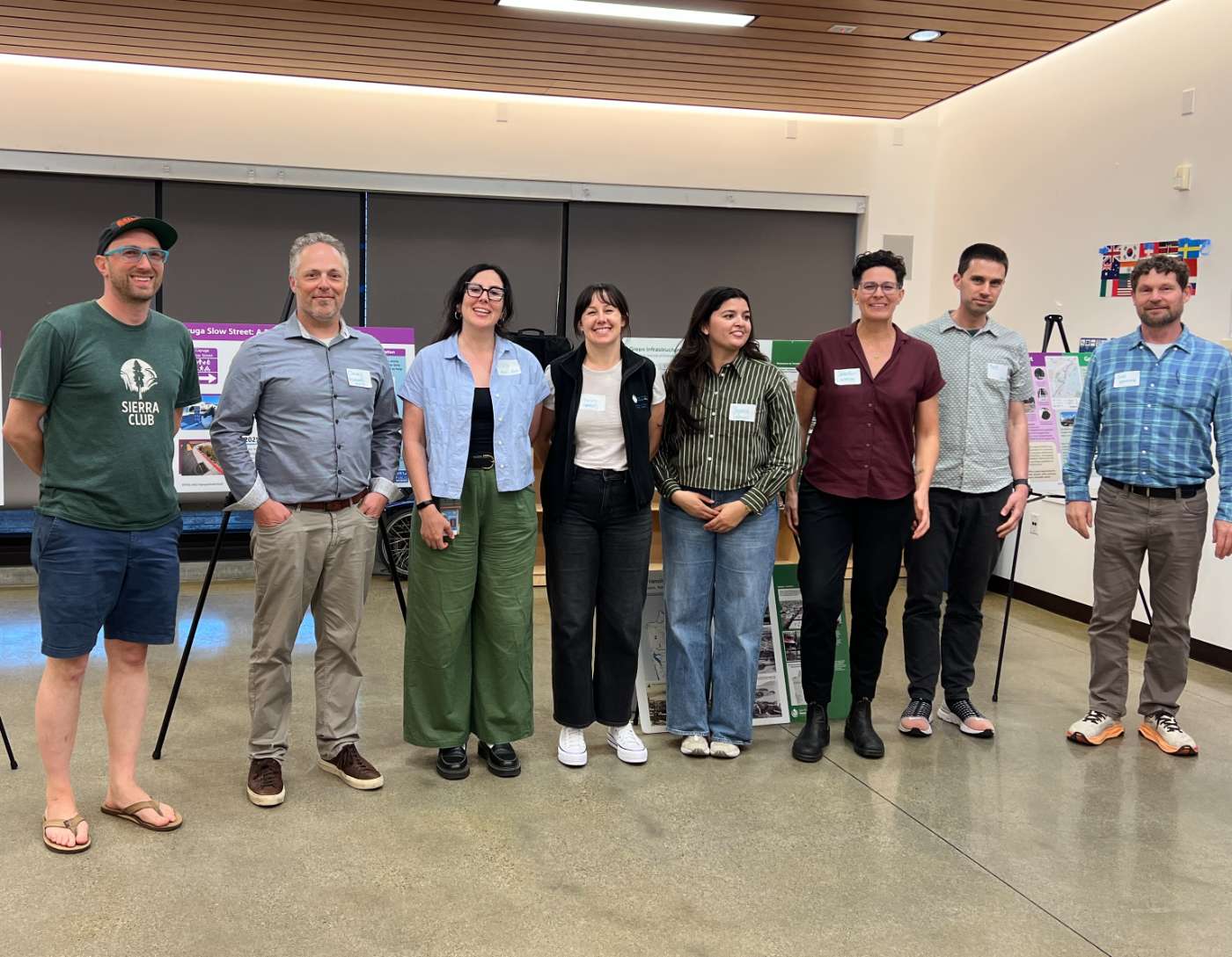 Project team and community members at the Cayuga / Alemany Greening open house, with Cayuga Slow Street project boards